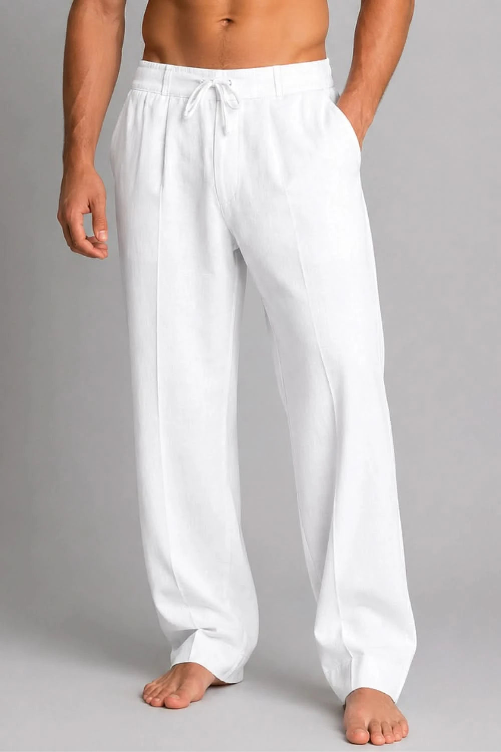 White pants worn by a person on a gray background